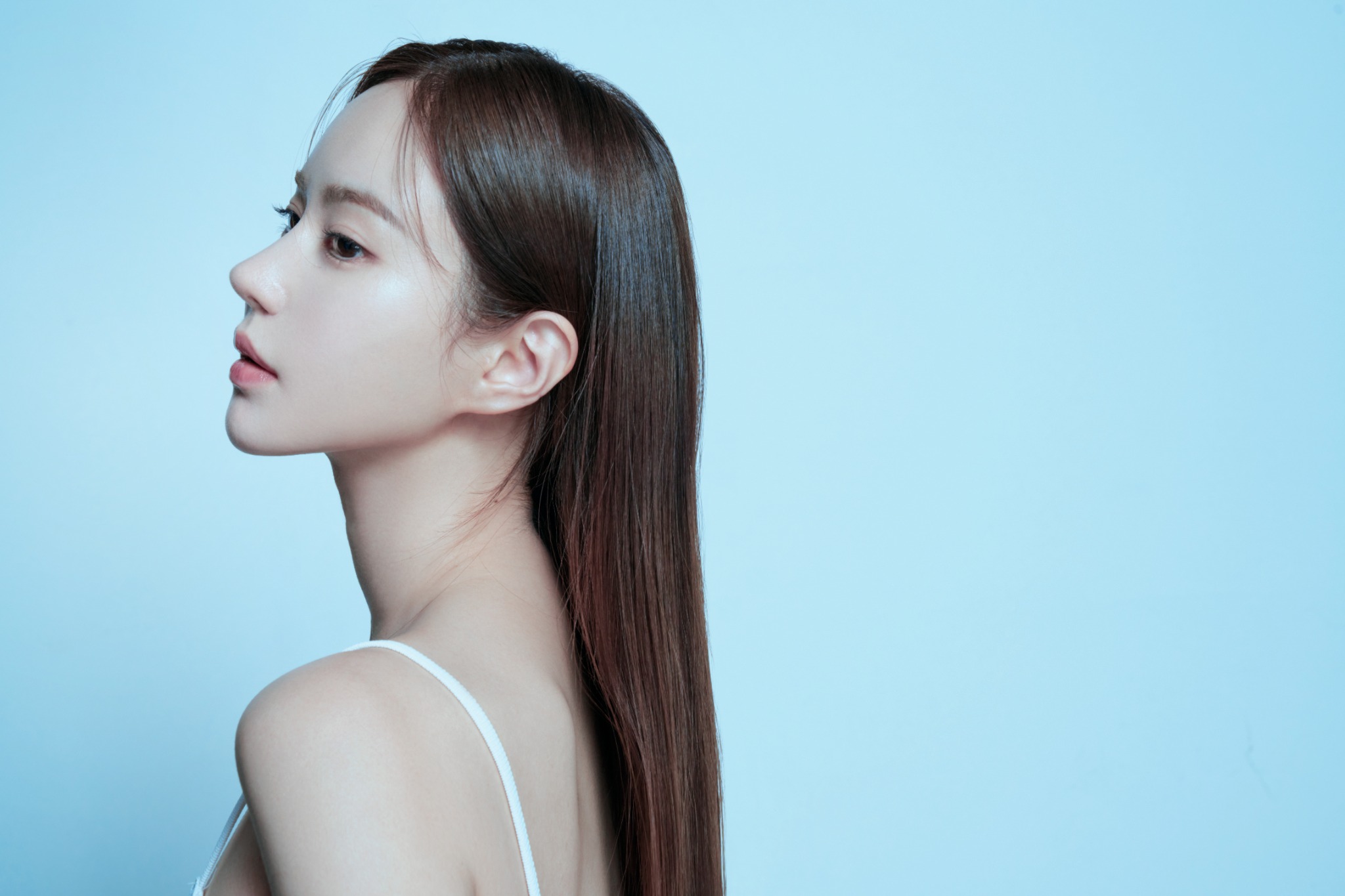 ID Hospital female model profile on blue background