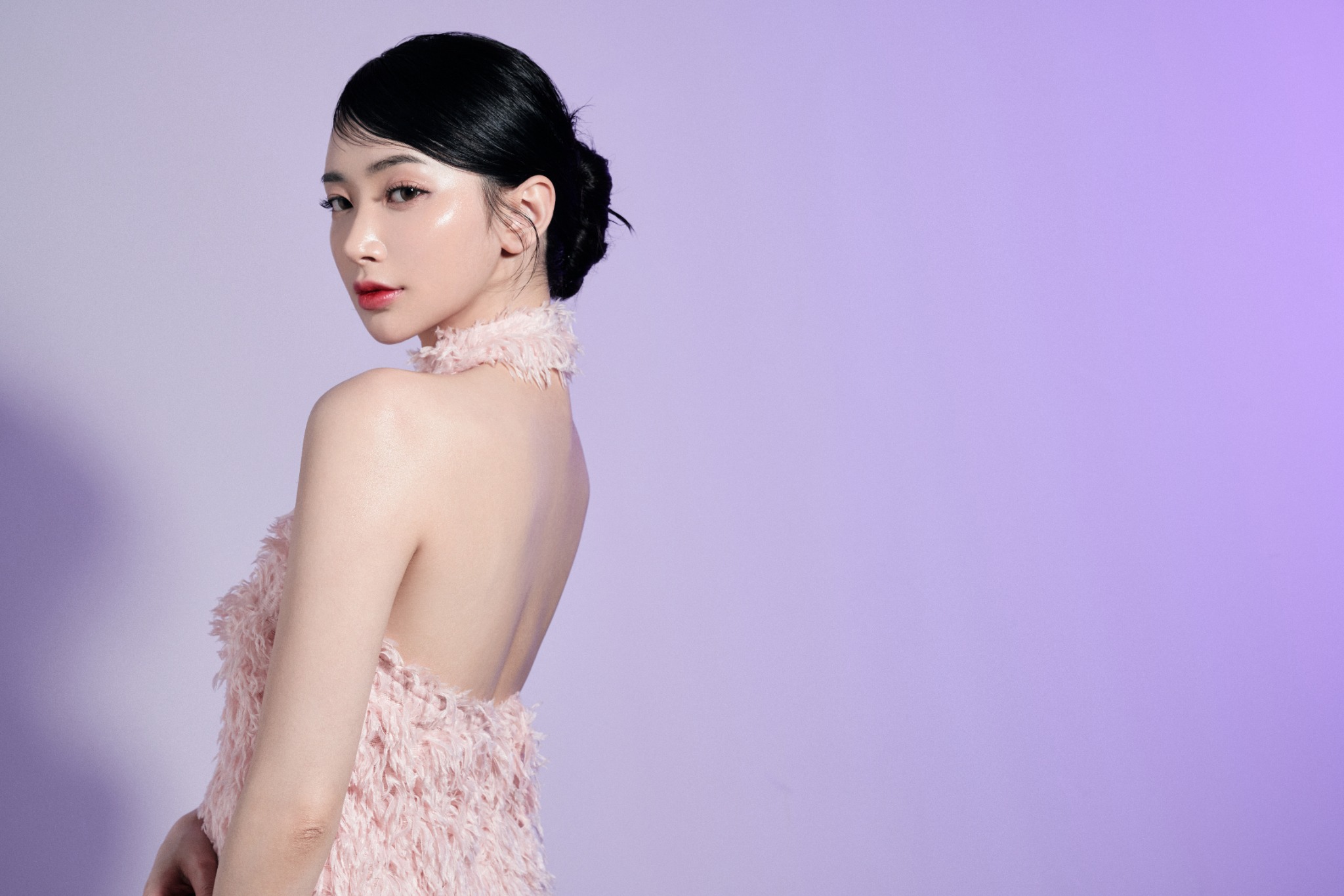 ID Hospital female model on a violet background